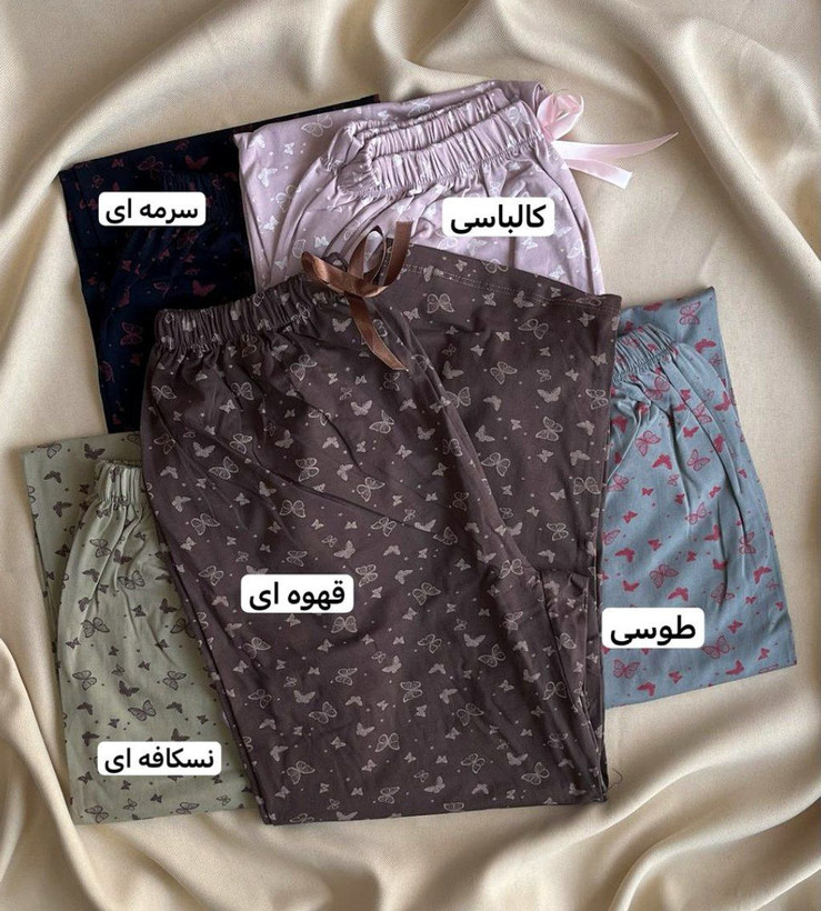 شلوار زنانه دخترانه راحتی راسته جنس نخ پنبه لاکرادار کمرکش پاپیونی تمام چاپ پروانه با تنخور خوشگل و دوست داشتنی